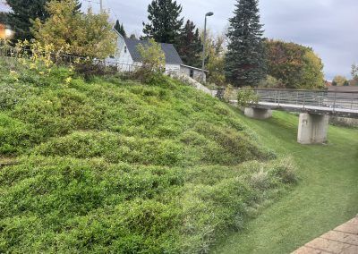 Walkway in back of Pleasant Valley Apartments building to street in Crystal Falls.