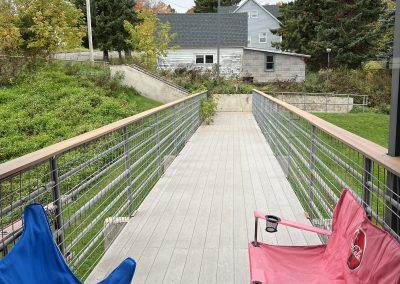Back entrance with folding chairs and path to road in Crystal Falls, Michigan.